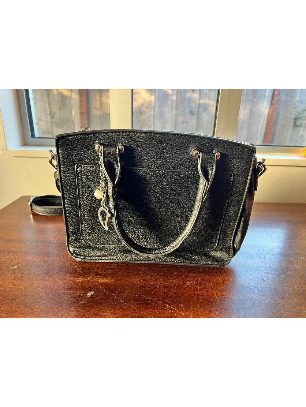 Black Faux Leather Handbag with Dual Handles and Adjustable Shoulder Strap